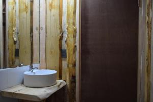 Ванная комната в Proyecto COYAM, cabañas lofts, tinas privadas, sendero por el bosque
