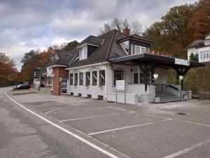 a parking lot in front of a building at Achilleon III in Geesthacht