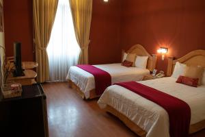 Posteľ alebo postele v izbe v ubytovaní Hotel Inka Path