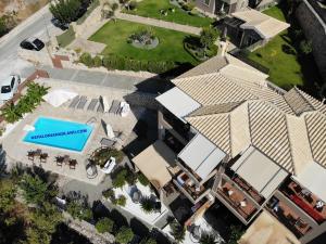 an overhead view of a house with a swimming pool at Katarina Apartments in Kefallonia
