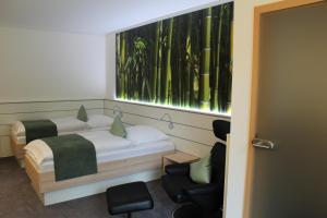 Postel nebo postele na pokoji v ubytování Hotel Ripken