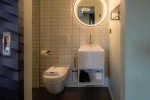 Baðherbergi á BLOOM Boutique Hotel & Lounge Basel