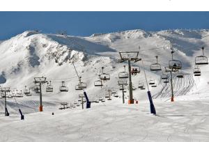 Lux Aigle "Acceso directo a pistas" að vetri til