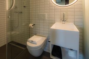 Baðherbergi á BLOOM Boutique Hotel & Lounge Basel