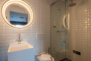Baðherbergi á BLOOM Boutique Hotel & Lounge Basel