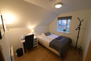 Letto o letti in una camera di Guesthouse Carina