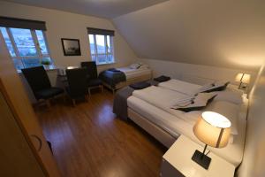 Postel nebo postele na pokoji v ubytování Guesthouse Carina