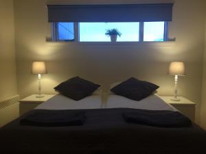 Letto o letti in una camera di Guesthouse Carina