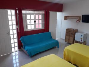 Pousada e Hostel Boneca de Pano tesisinde bir oturma alanı
