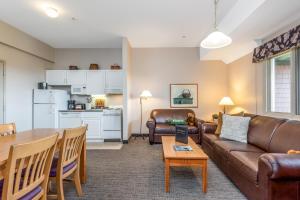 a living room with a couch and a table at Jordan Hotel in Newry