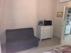 A television and/or entertainment centre at AL GELSOMINO