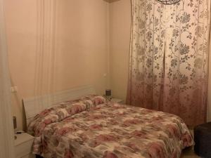 A bed or beds in a room at AL GELSOMINO