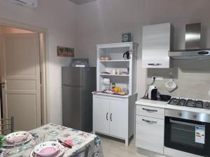 Virtuvė arba virtuvėlė apgyvendinimo įstaigoje AL GELSOMINO