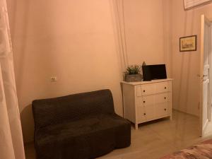A television and/or entertainment centre at AL GELSOMINO