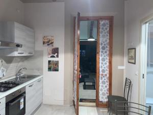 A kitchen or kitchenette at AL GELSOMINO