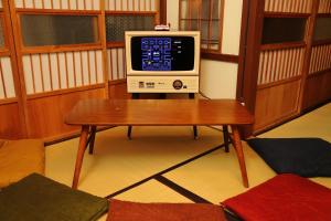 TV a/nebo společenská místnost v ubytování Fuji Time Traveler