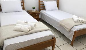 Postel nebo postele na pokoji v ubytování Apto Cond Ilhas do Caribe - Pr - Beira Mar + 37 fotografií