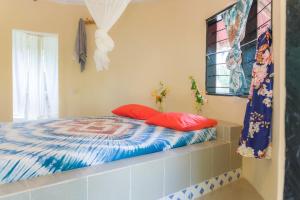 Кровать или кровати в номере Tamba Kuruba Eco-lodge