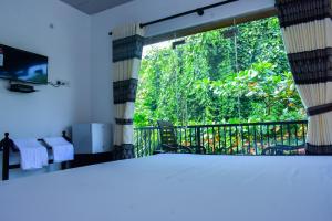 Letto o letti in una camera di Minuri Villa