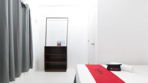 Letto o letti in una camera di RedDoorz near Liceo De Cagayan University Highschool