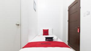 Letto o letti in una camera di RedDoorz near Liceo De Cagayan University Highschool