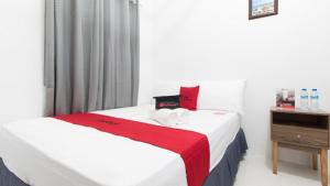 Letto o letti in una camera di RedDoorz near Liceo De Cagayan University Highschool