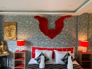 Letto o letti in una camera di Fong Kaew and Baan Nang Fa Guesthouse