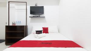 Letto o letti in una camera di RedDoorz near Liceo De Cagayan University Highschool