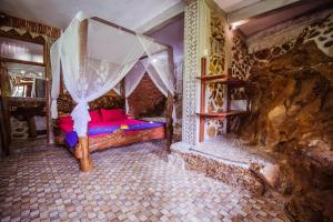 Postel nebo postele na pokoji v ubytování Garden Inn
