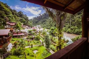 a view from the balcony of a resort at Garden Inn in Bukit Lawang