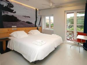 Cama o camas de una habitación en Hosteria Santander
