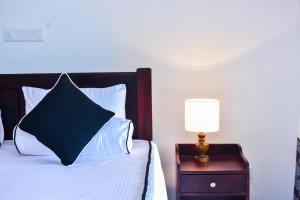 Letto o letti in una camera di Minuri Villa