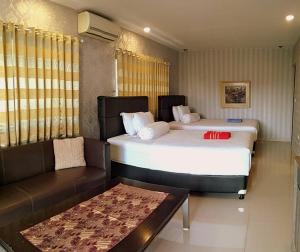Voodi või voodid majutusasutuse Jos & Hanny Homestay toas