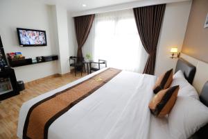Ένα ή περισσότερα κρεβάτια σε δωμάτιο στο Bảo Hân 2 Hotel
