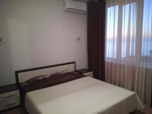 
Кровать или кровати в номере Apartment on Prosveshcheniya 84
