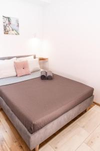Posteľ alebo postele v izbe v ubytovaní BalticSea Apartamenty