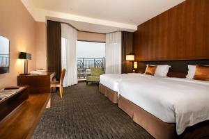 Letto o letti in una camera di Silks Place Yilan