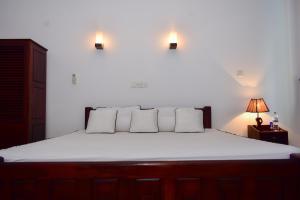 Letto o letti in una camera di Minuri Villa