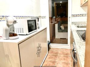A kitchen or kitchenette at MARBELLA ALICATE BEACHFRONT - Luxury Apartment-2