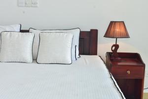 Letto o letti in una camera di Minuri Villa