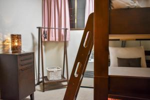 Letto o letti in una camera di Mojo Lodge Hakuba