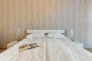 Posteľ alebo postele v izbe v ubytovaní GRANO FLATS Gdańsk - Aura I