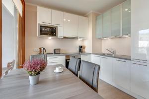 Kuchyňa alebo kuchynka v ubytovaní GRANO FLATS Gdańsk - Aura I