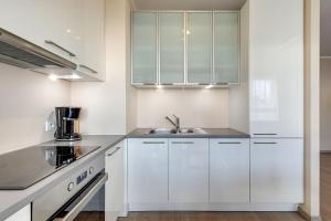 Kuchyňa alebo kuchynka v ubytovaní GRANO FLATS Gdańsk - Aura I