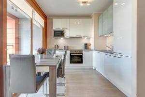 Kuchyňa alebo kuchynka v ubytovaní GRANO FLATS Gdańsk - Aura I
