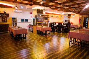 En restaurant eller et spisested på The Mang-Yan Grand Hotel powered by Cocotel