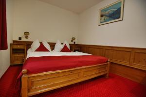Postel nebo postele na pokoji v ubytování Hotel Jelinek