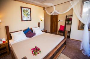 Voodi või voodid majutusasutuse Clove Island Villas & Spa toas