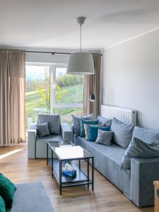 Posedenie v ubytovaní Apartament Słoneczna 7