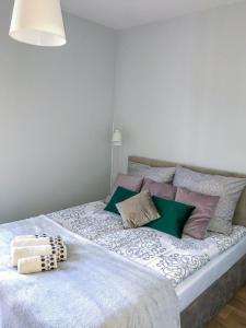 Posteľ alebo postele v izbe v ubytovaní Apartament Słoneczna 7